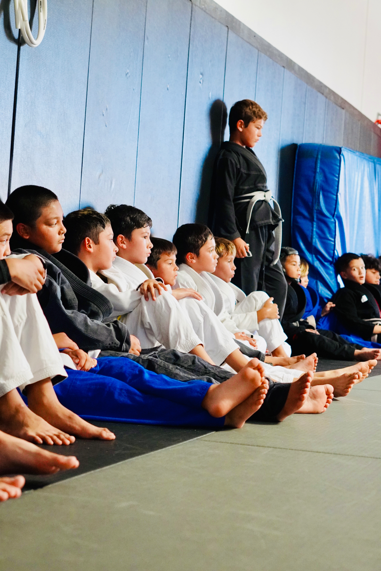 GDA youth grappling athletes lined up and focused during a training session in San Diego